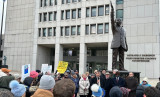 Rep. Latimer in front of an MLS statue talking about voting rights